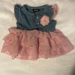 Denim and pink ruffle dress for little girl